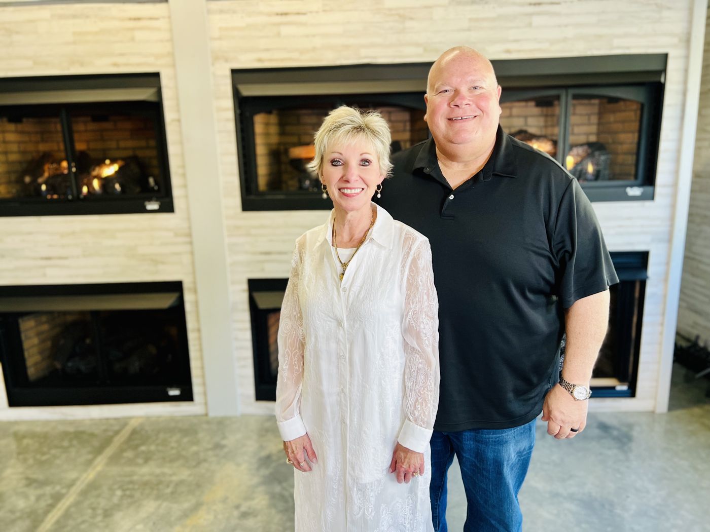 The owners of Ouachita Hearth & Patio in the showroom
